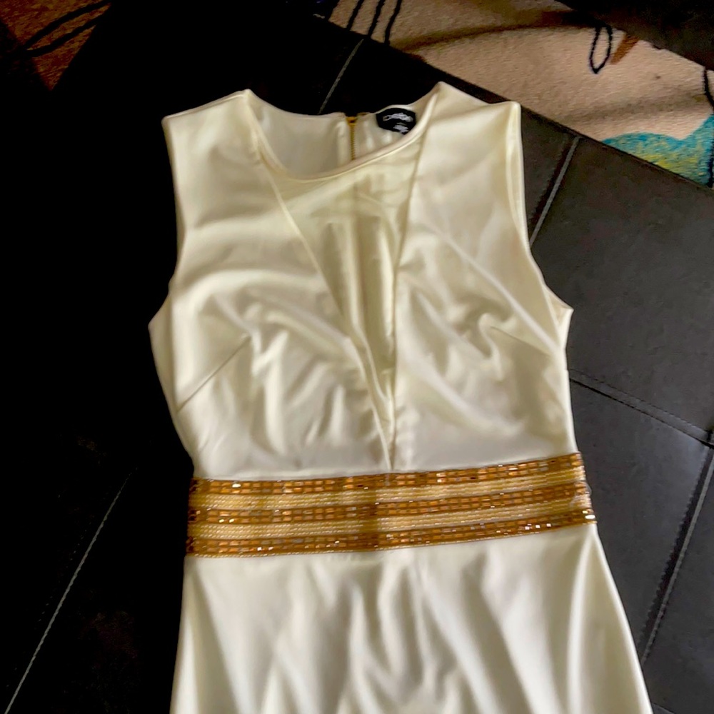 Beautiful cream Bebe dress.